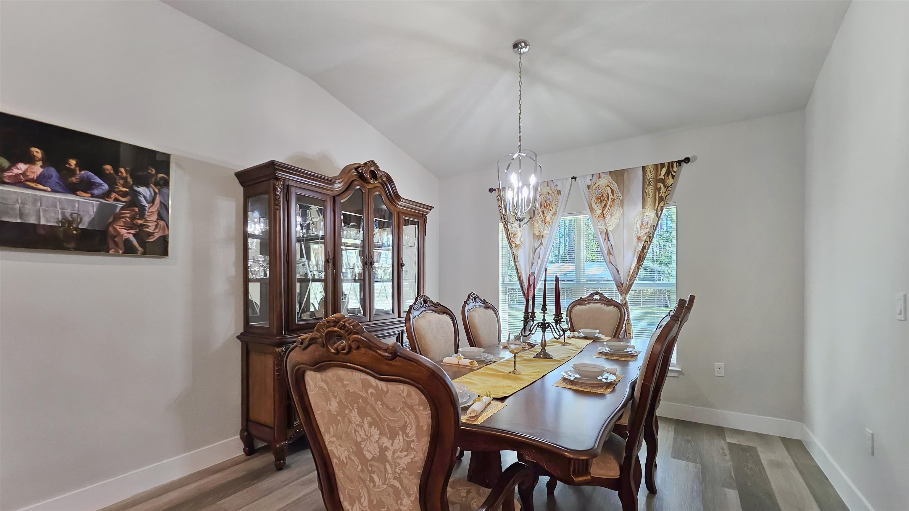 7 Smith Trail Palm Coast, FL 32164 - Photo 16 of 48 a view of a dining room with furniture and chandelier