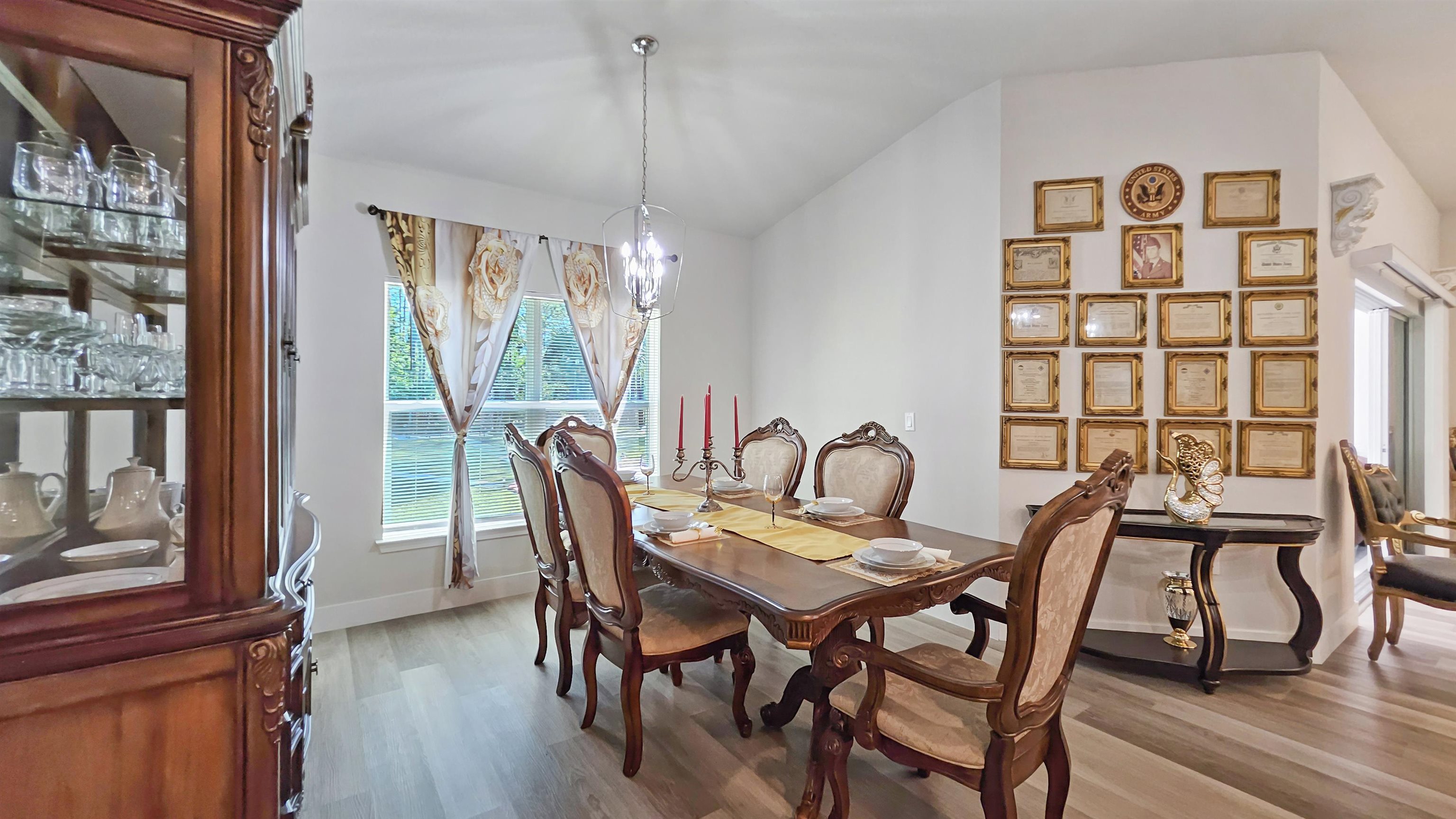 7 Smith Trail Palm Coast, FL 32164 - Photo 17 of 48 a view of a dining room with furniture window and wooden floor
