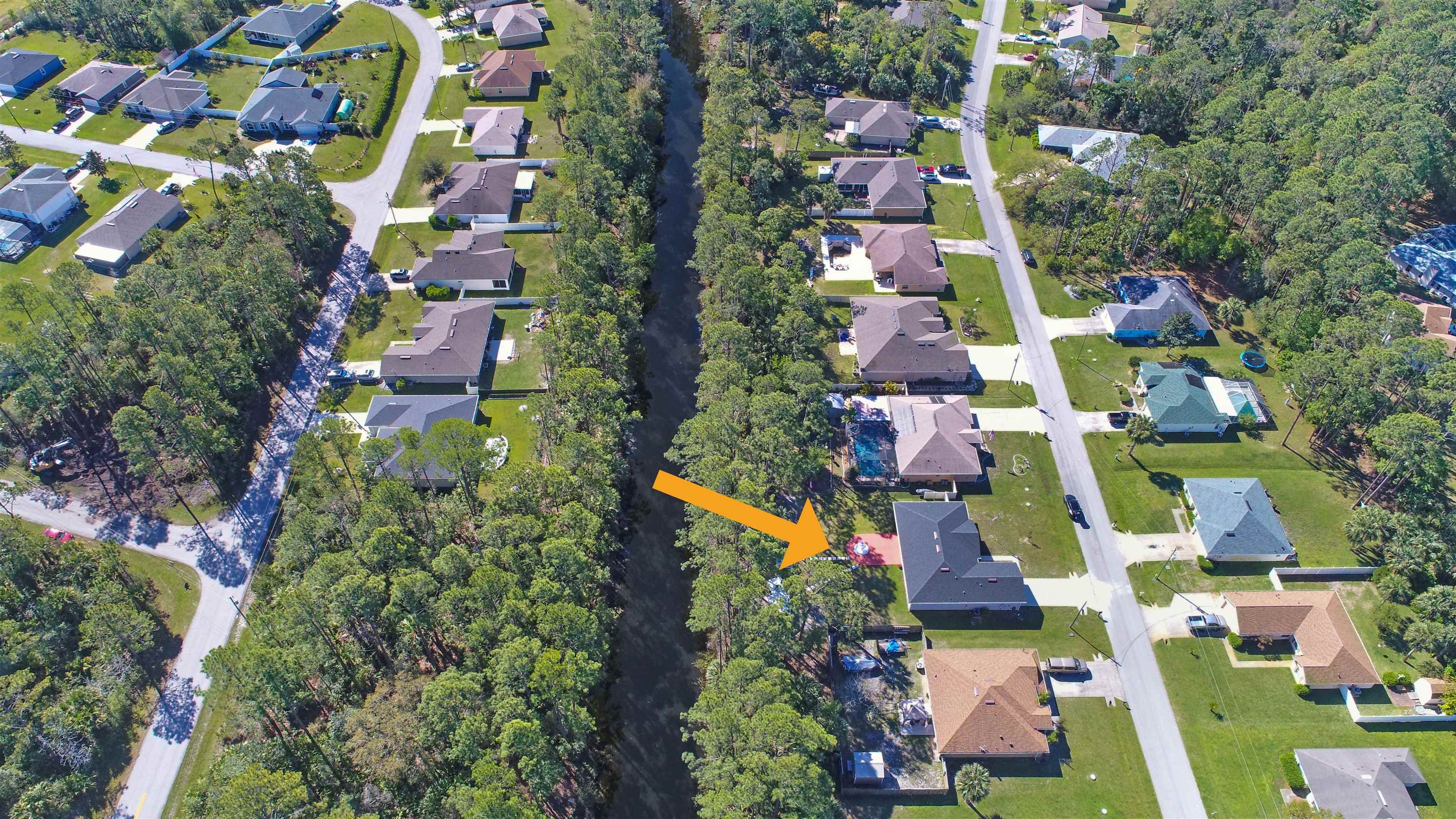 7 Smith Trail Palm Coast, FL 32164 - Photo 2 of 48 an aerial view of residential houses with outdoor space and street view
