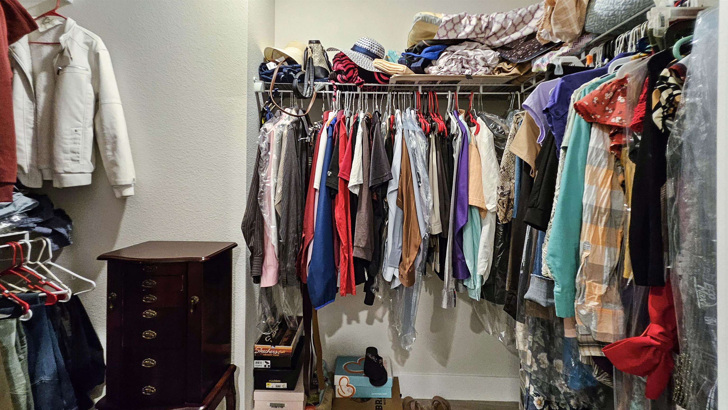 7 Smith Trail Palm Coast, FL 32164 - Photo 23 of 48 a view of walk in closet with clothes