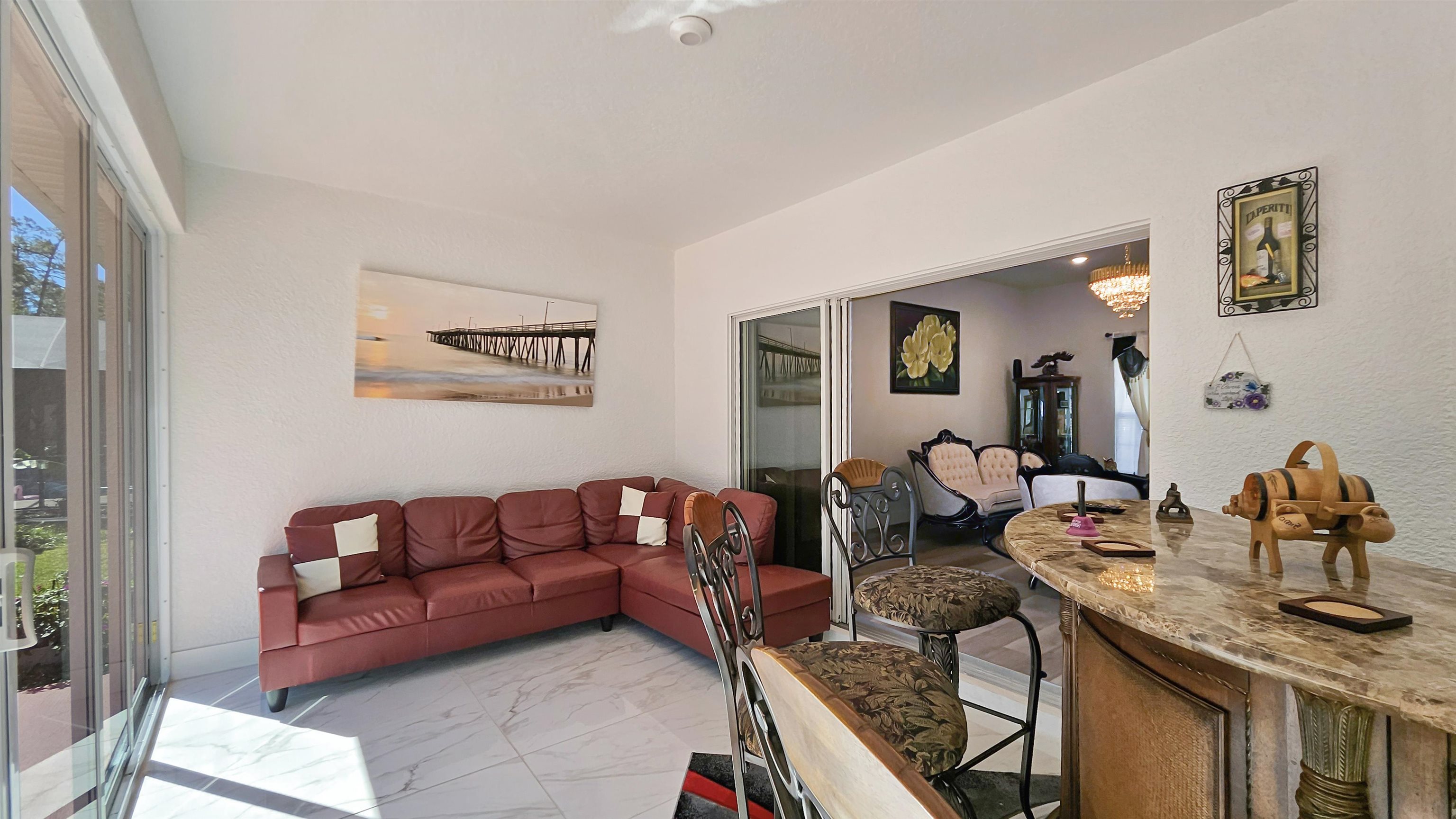 7 Smith Trail Palm Coast, FL 32164 - Photo 31 of 48 a living room with furniture two night stand and a window