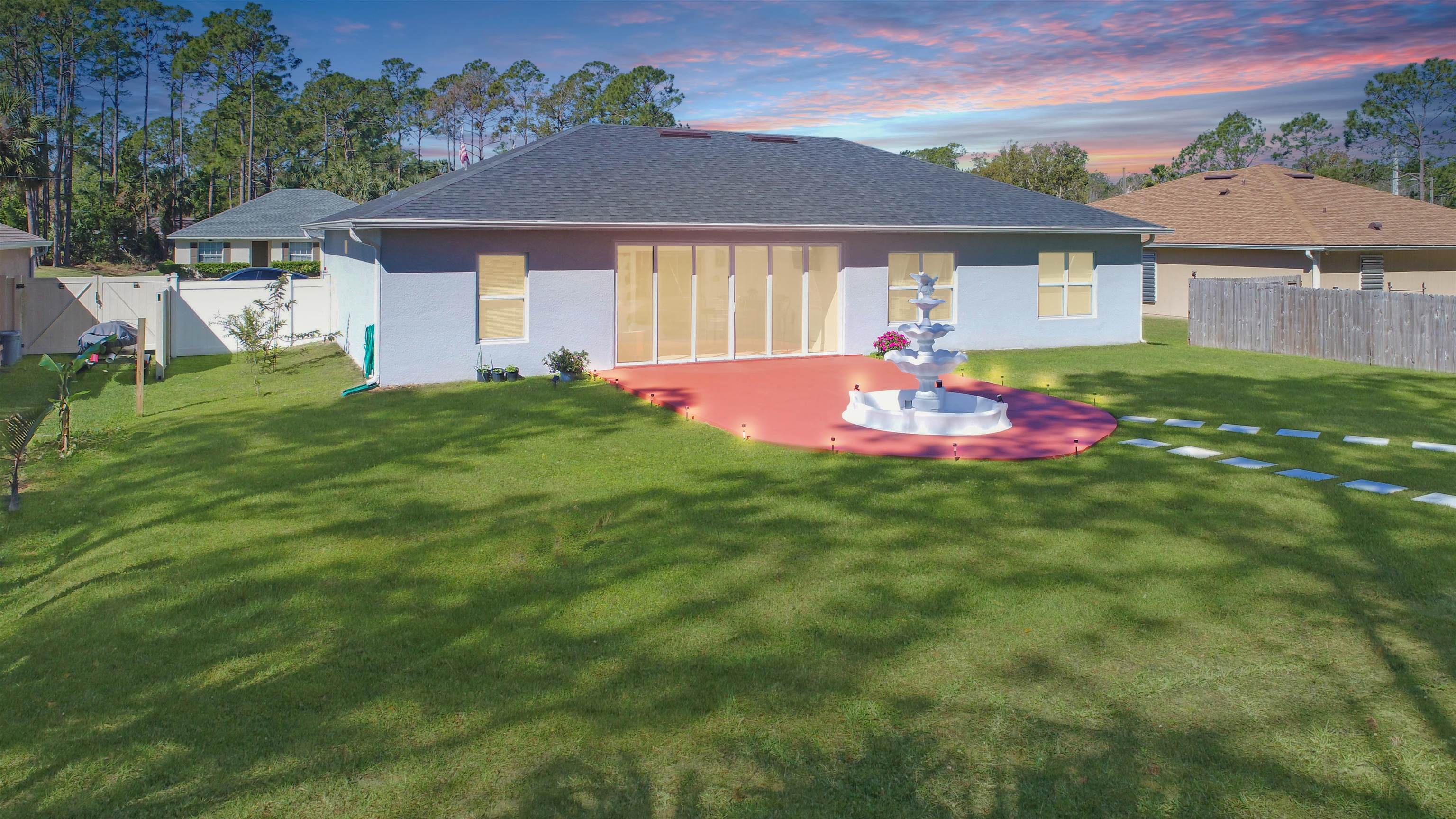 7 Smith Trail Palm Coast, FL 32164 - Photo 35 of 48 a front view of a house with a yard