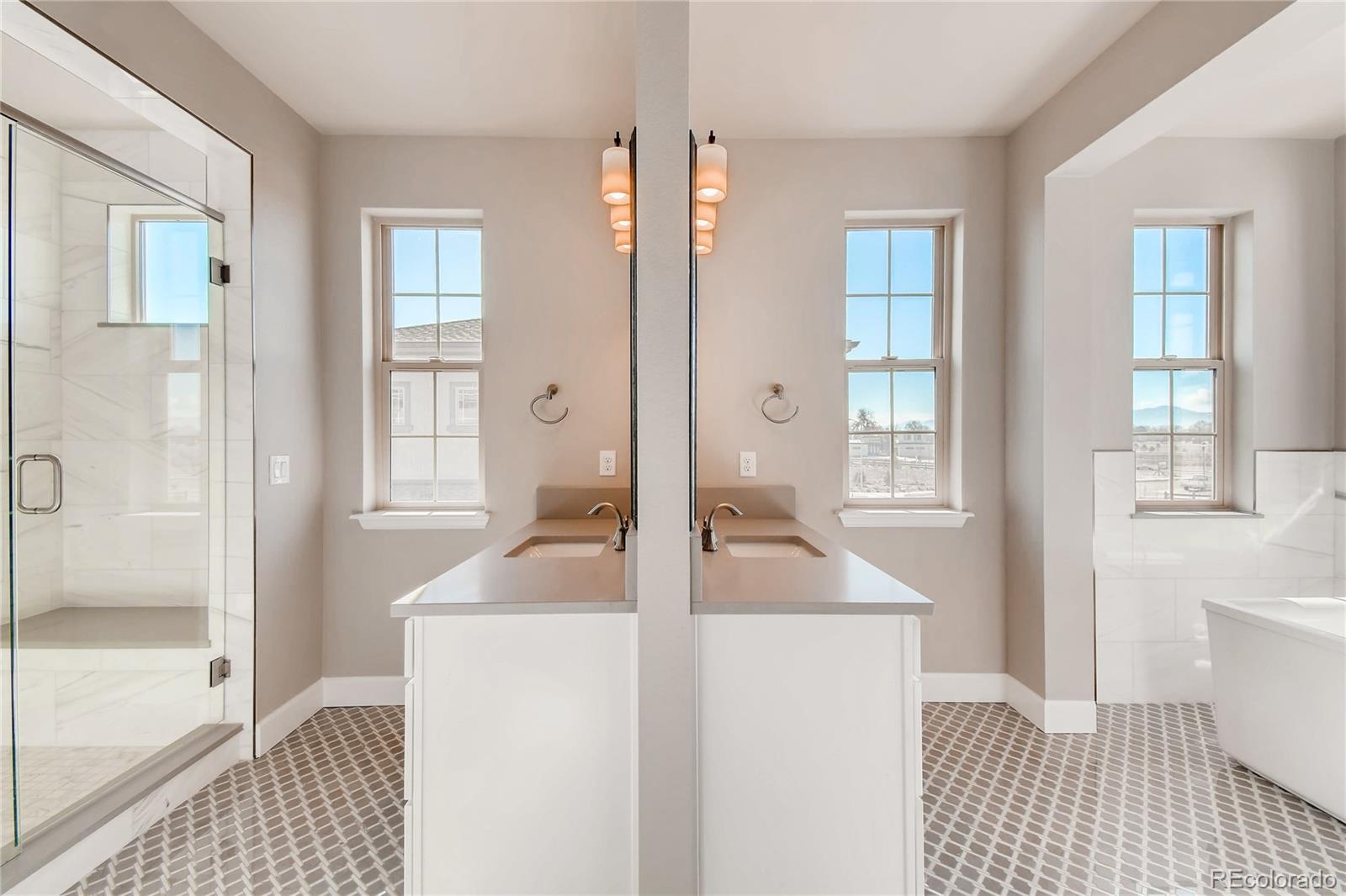 2293 Picadilly Circle Longmont, CO 80503 - Photo 25 of 35 a living room with furniture and a table