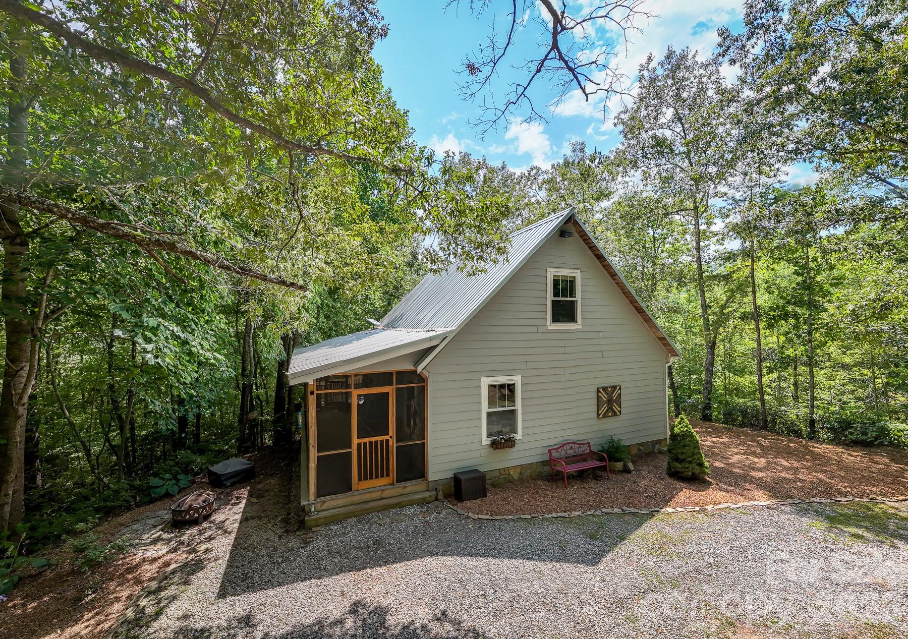 292 Wolf Creek Heights Road Almond, NC 28702 - Photo 3 of 47 a view of a house with a yard