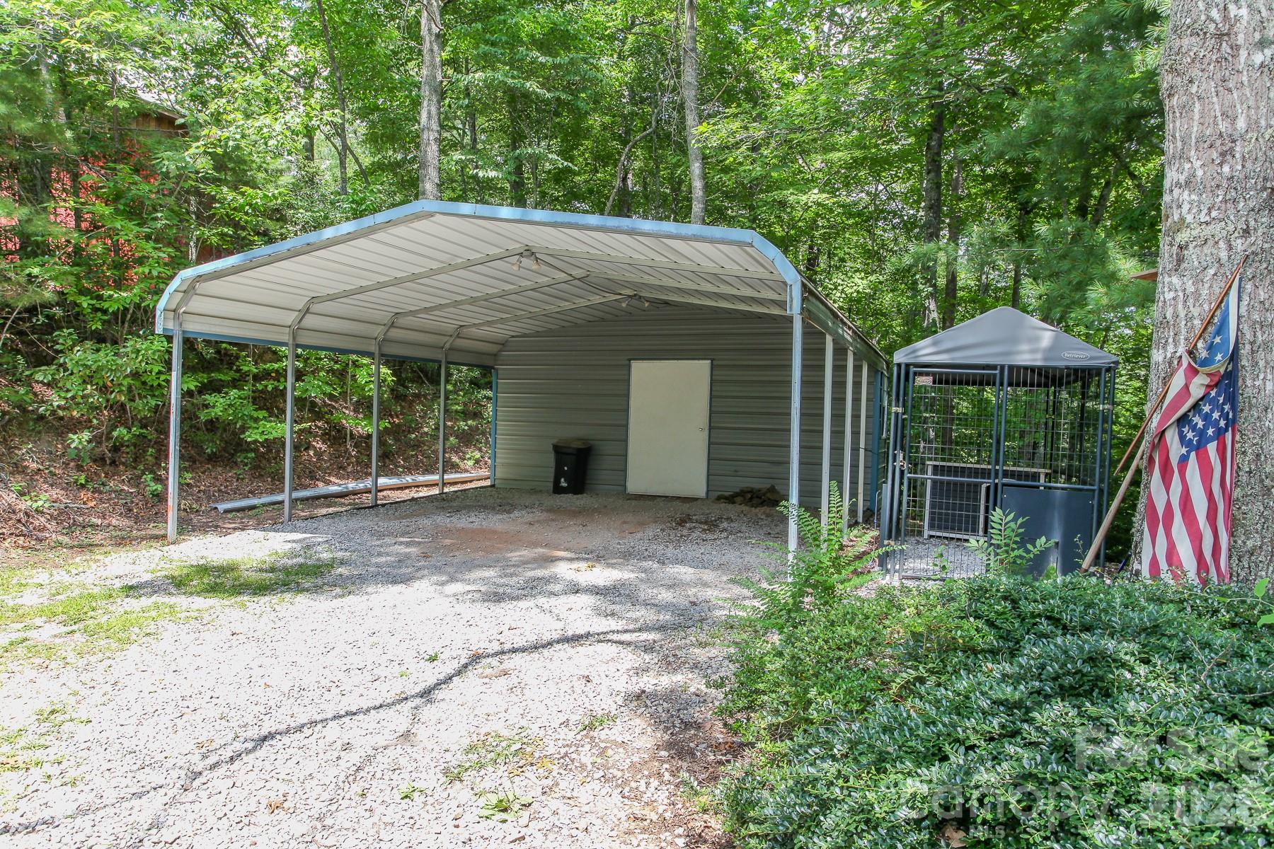 292 Wolf Creek Heights Road Almond, NC 28702 - Photo 35 of 47 a view of a house with backyard and sitting area
