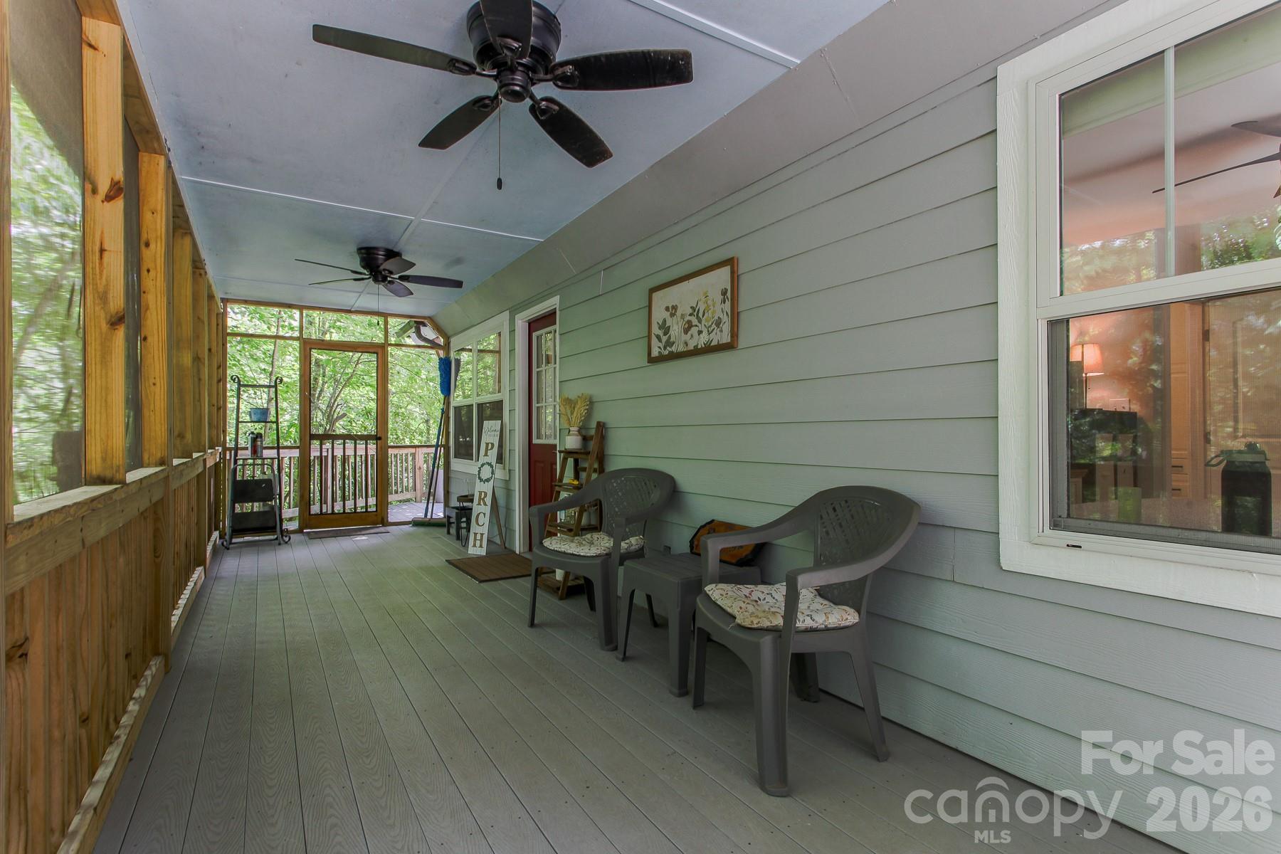 292 Wolf Creek Heights Road Almond, NC 28702 - Photo 9 of 47 a living room with furniture and a window