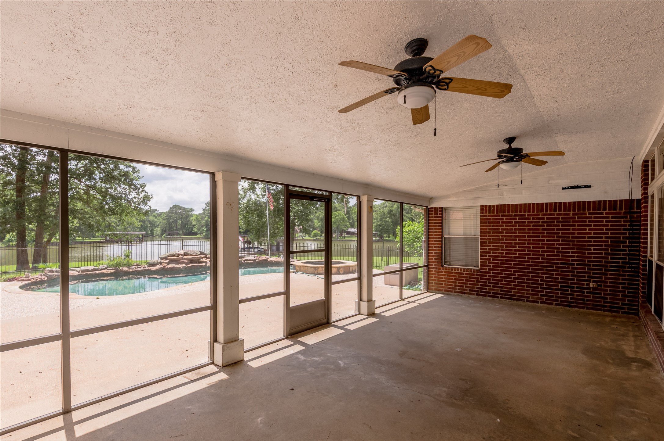324 Red Oak Lane Trinity, TX 75862 - Photo 36 of 49 a view of a livingroom with a ceiling fan and window
