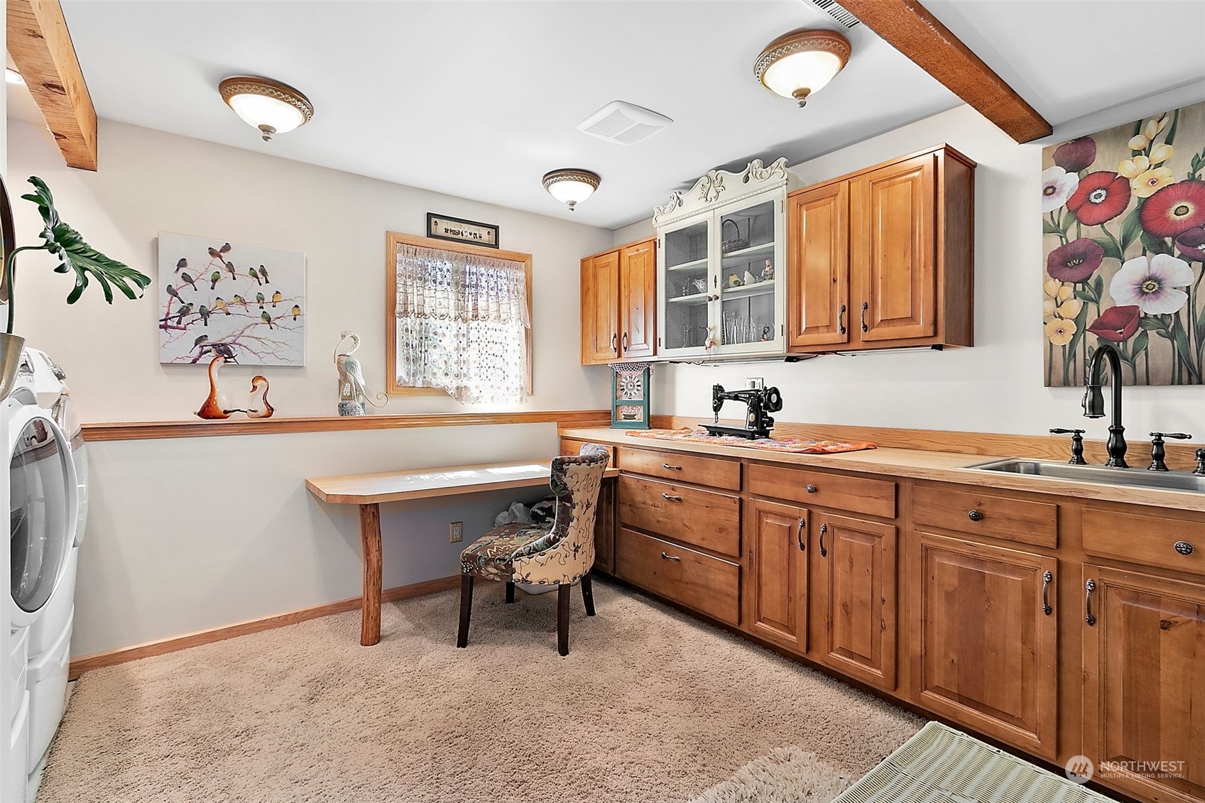 4152 Southwest 314th Street Federal Way, WA 98023 - Photo 13 of 36 a kitchen with a sink cabinets and dining table