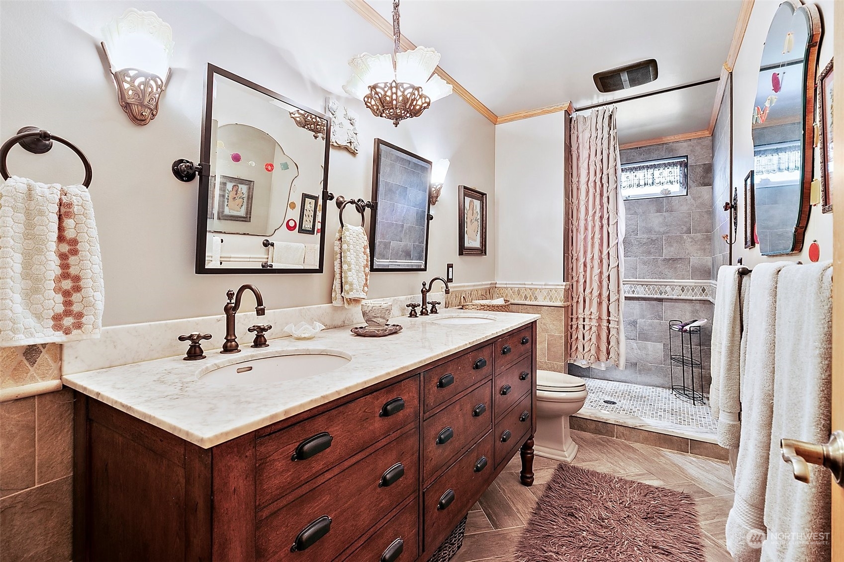 4152 Southwest 314th Street Federal Way, WA 98023 - Photo 14 of 36 a bathroom with a sink double vanity and a shower