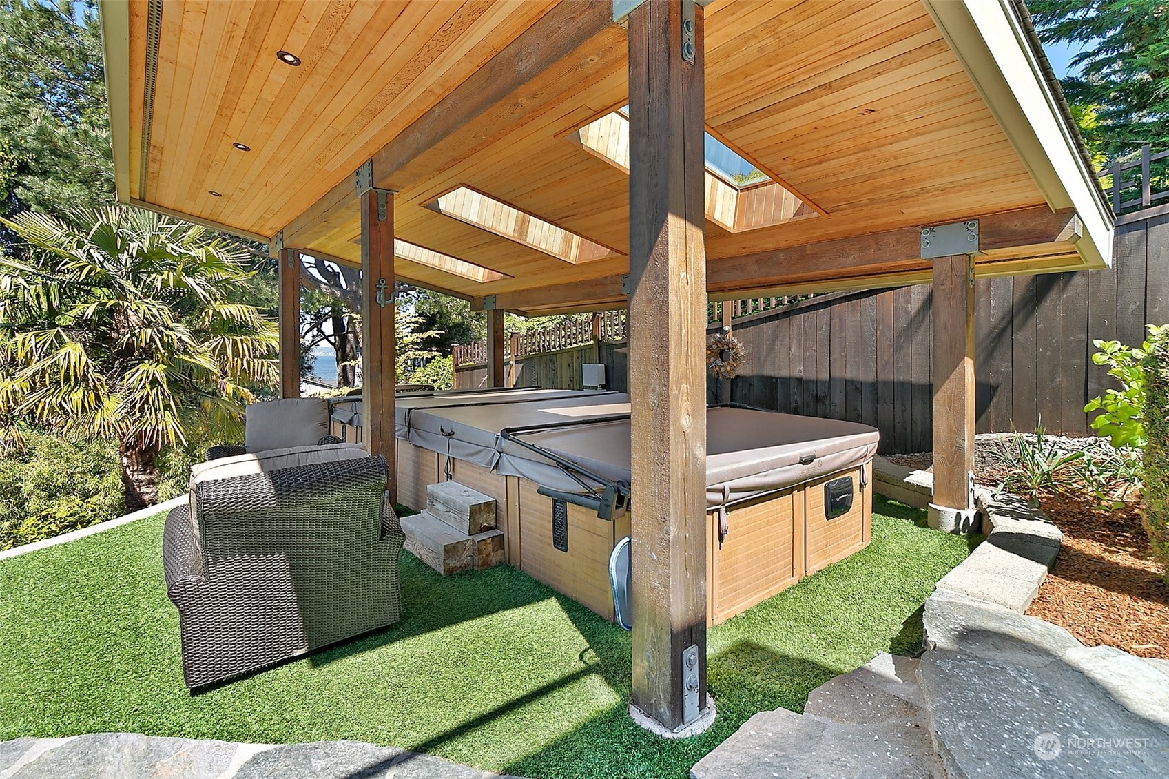 4152 Southwest 314th Street Federal Way, WA 98023 - Photo 17 of 36 a view of a porch with couches potted plants with wooden fence