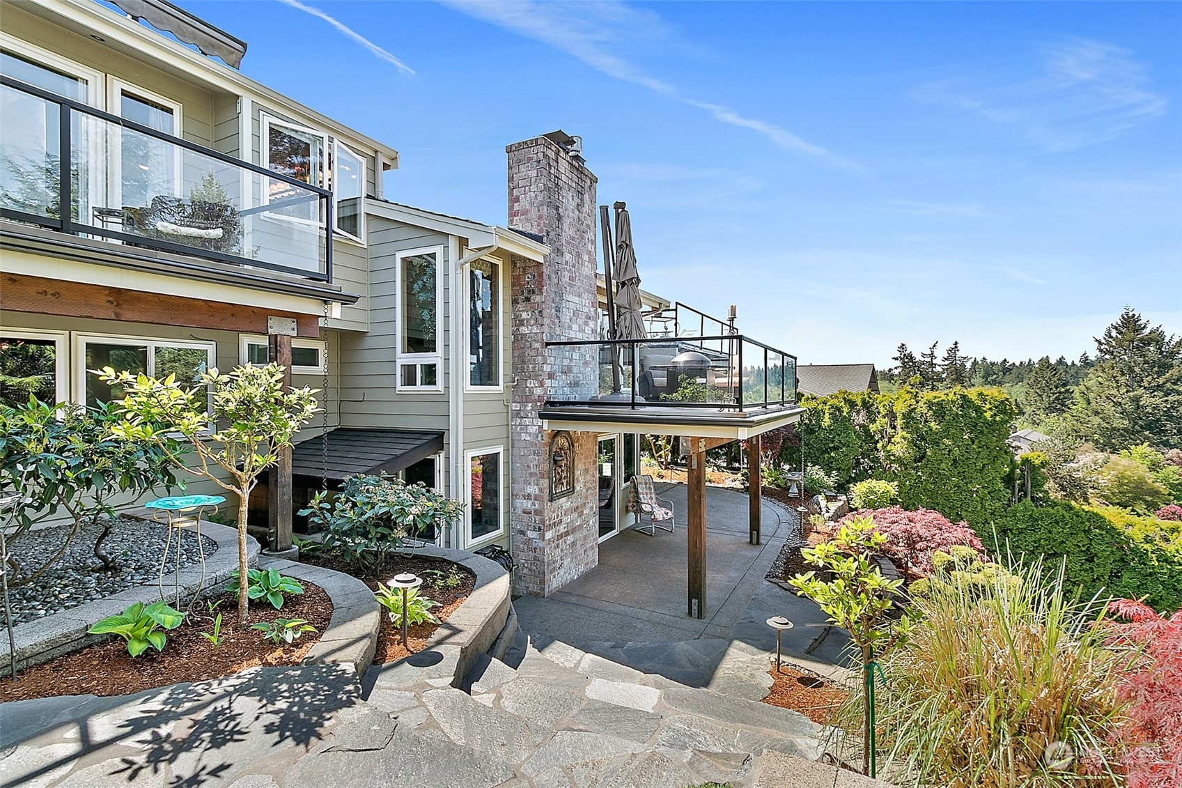 4152 Southwest 314th Street Federal Way, WA 98023 - Photo 18 of 36 a front view of a house with a garden