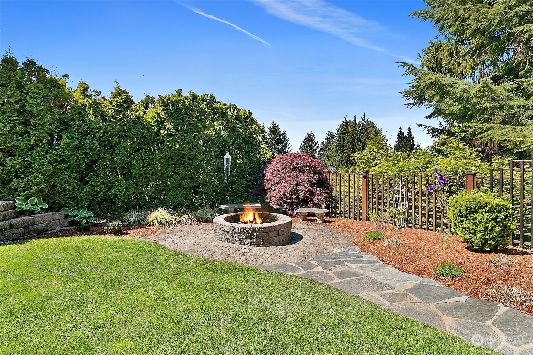 4152 Southwest 314th Street Federal Way, WA 98023 - Photo 20 of 36 a backyard of a house with a yard and outdoor seating