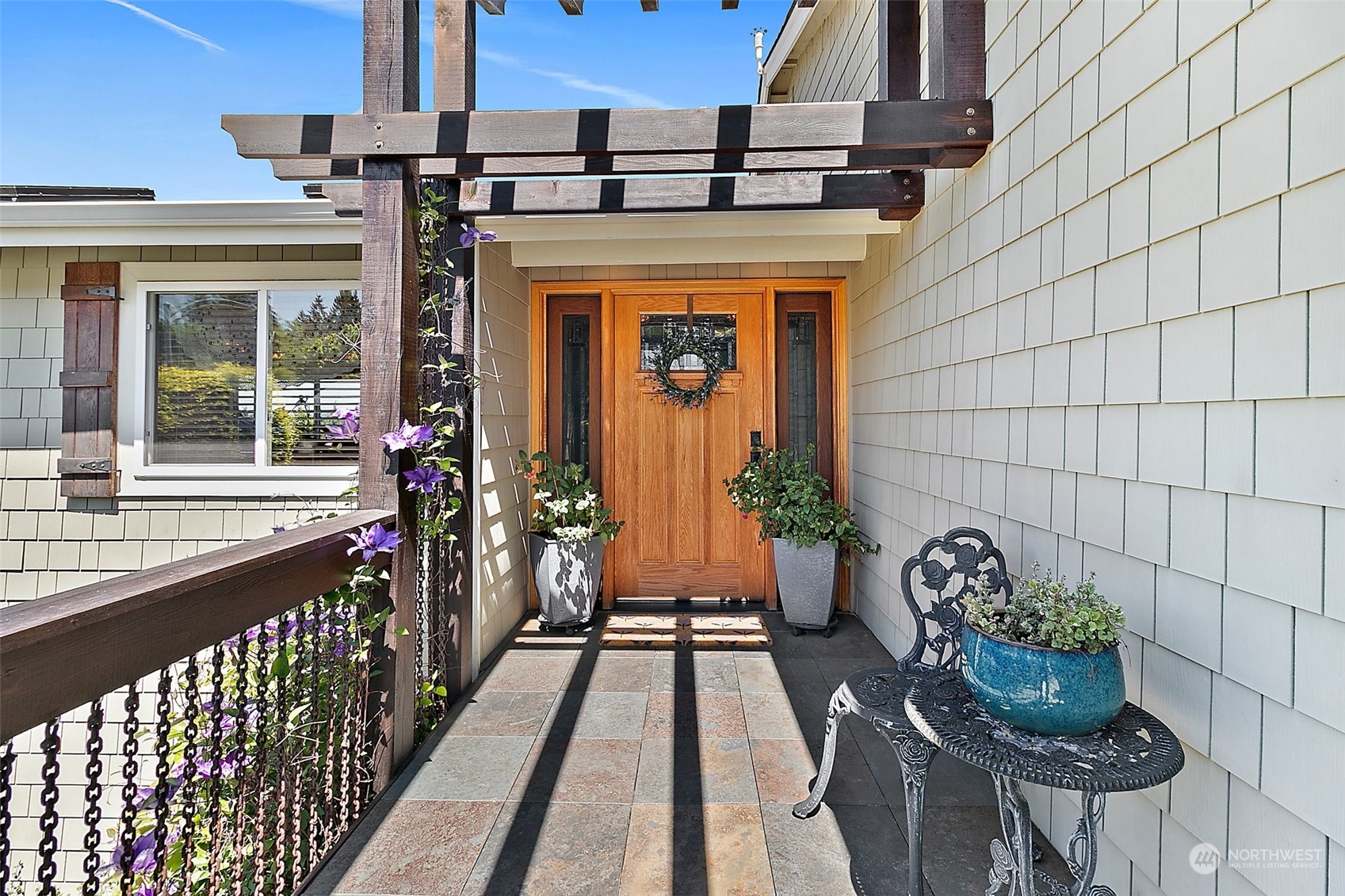 4152 Southwest 314th Street Federal Way, WA 98023 - Photo 2 of 36 a front view of a house with chairs