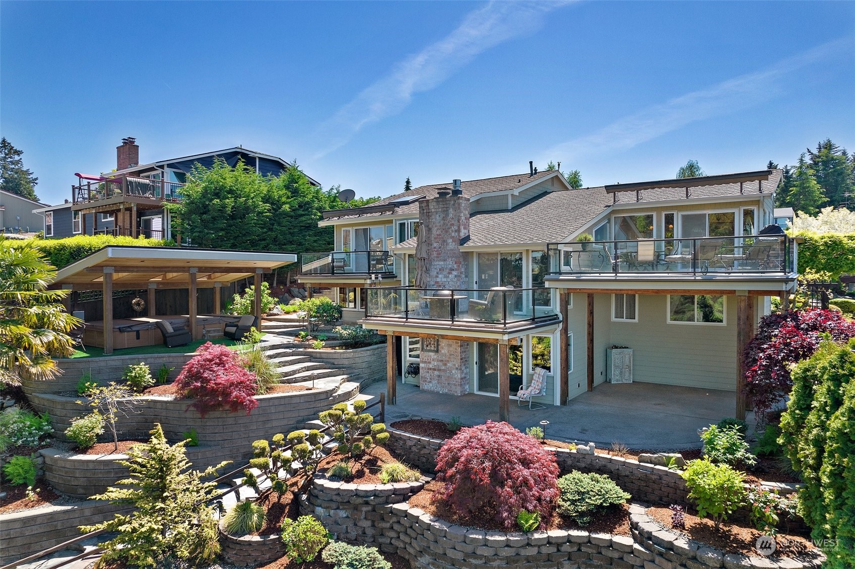 4152 Southwest 314th Street Federal Way, WA 98023 - Photo 22 of 36 a patio with table and chairs under an umbrella