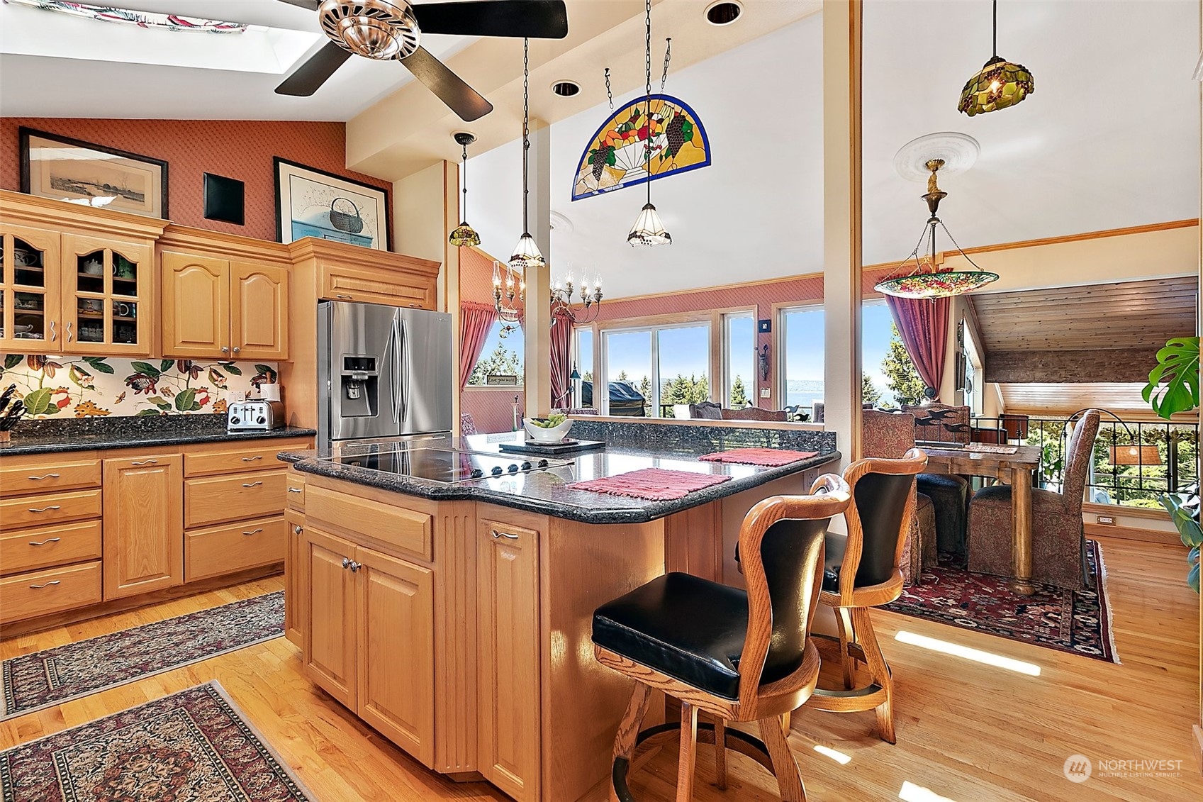 4152 Southwest 314th Street Federal Way, WA 98023 - Photo 26 of 36 a kitchen with a sink and chairs