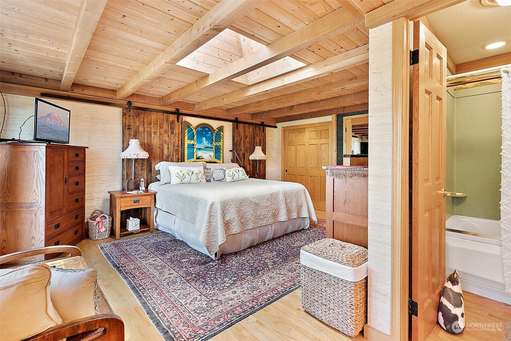 4152 Southwest 314th Street Federal Way, WA 98023 - Photo 27 of 36 a bedroom with a bed a table and chair