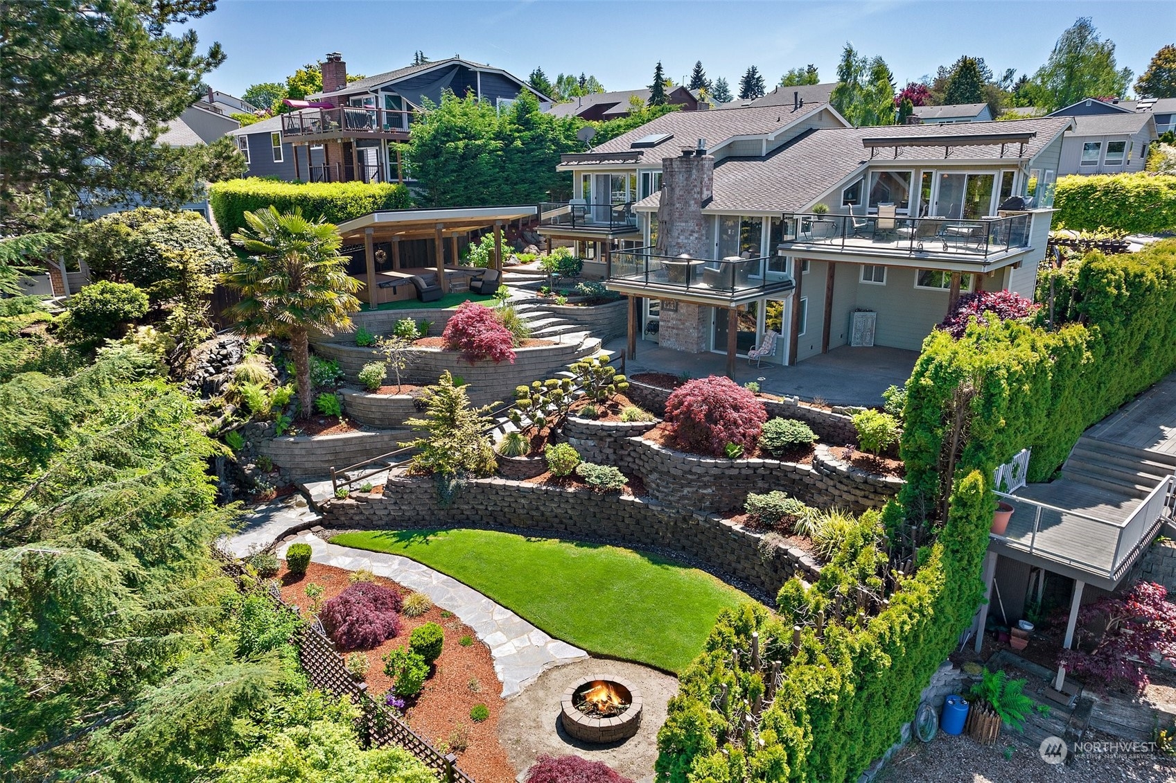 4152 Southwest 314th Street Federal Way, WA 98023 - Photo 36 of 36 a view of a patio with table and chairs potted plants