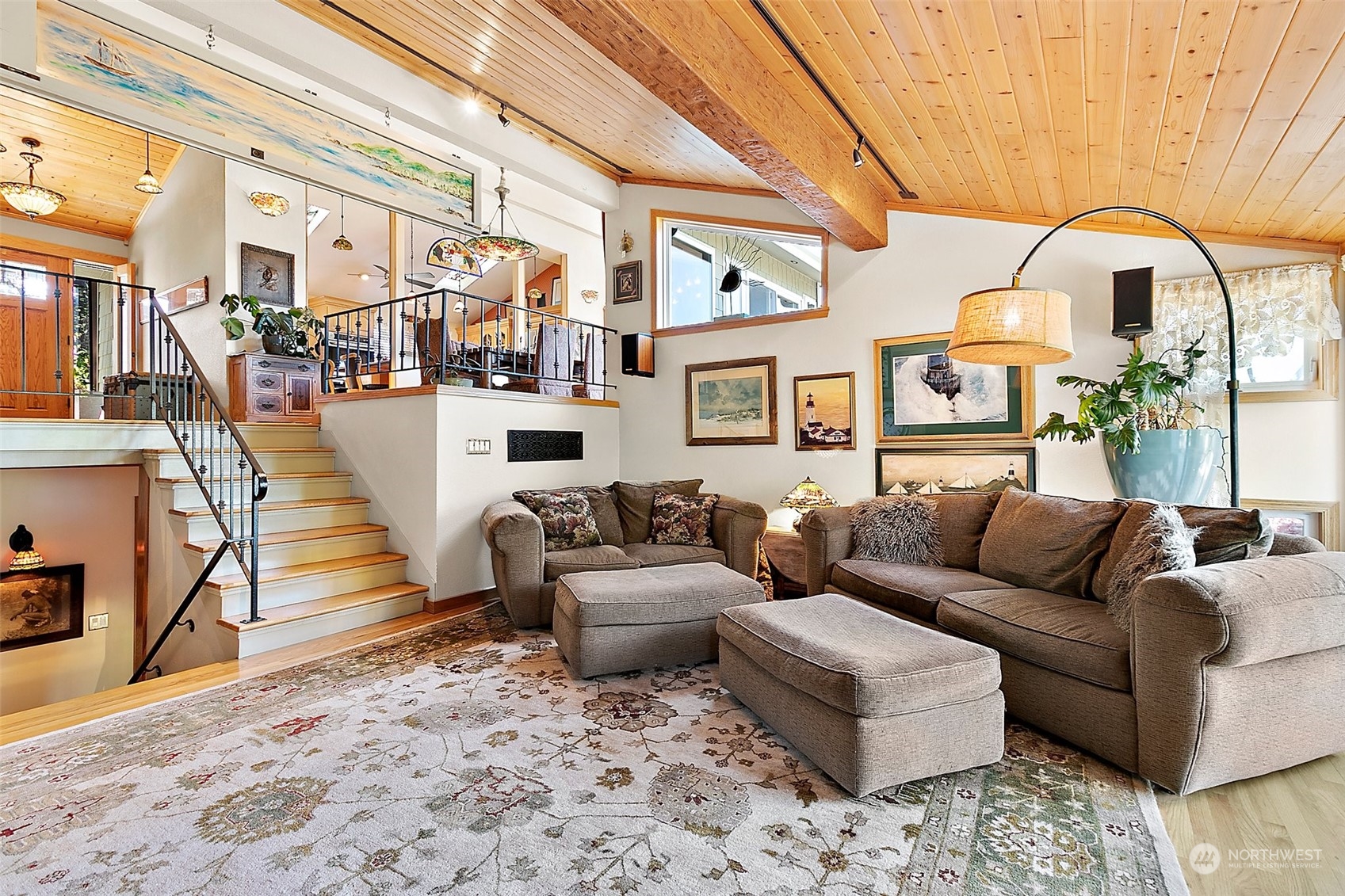 4152 Southwest 314th Street Federal Way, WA 98023 - Photo 10 of 36 a living room with furniture a fireplace and lots of windows