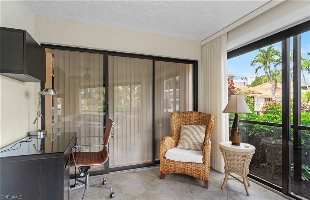 5890 Via Lugano, Unit 101 Naples, FL 34108 - Photo 11 of 22 a bathroom with a toilet and a window