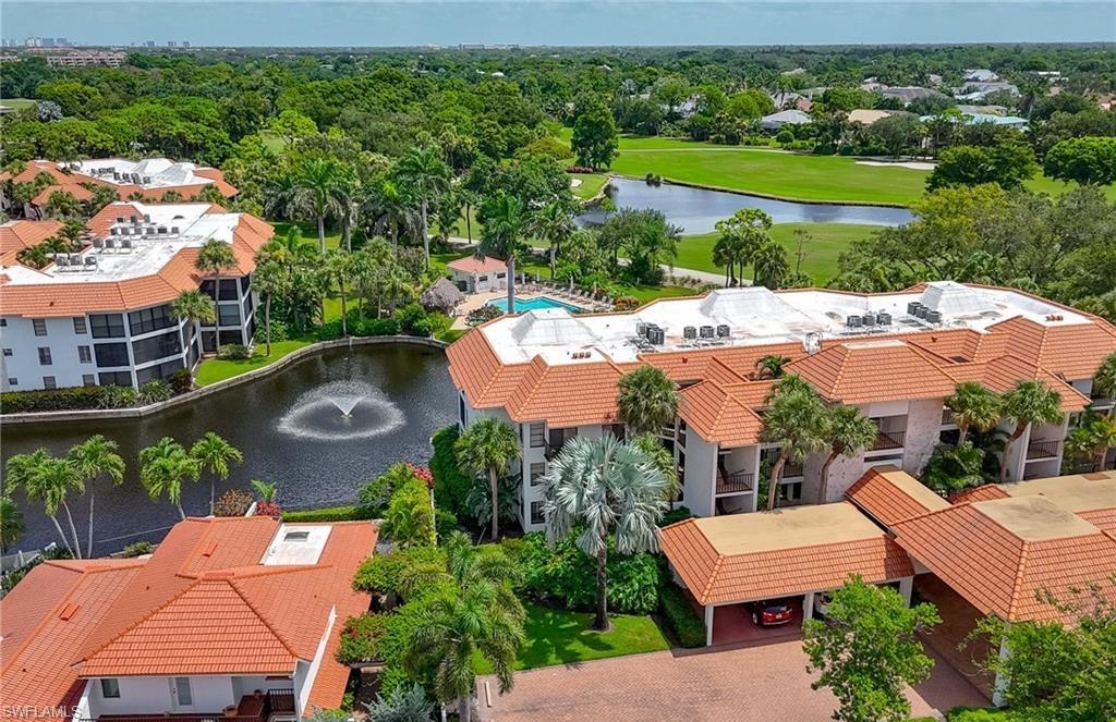5890 Via Lugano, Unit 101 Naples, FL 34108 - Photo 21 of 22 an aerial view of a house with outdoor space lake view