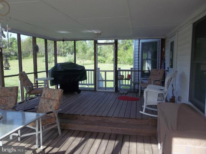 4310 Dunn Road Huntingtown, MD 20639 - Photo 11 of 25 Another view of the screened in Patio