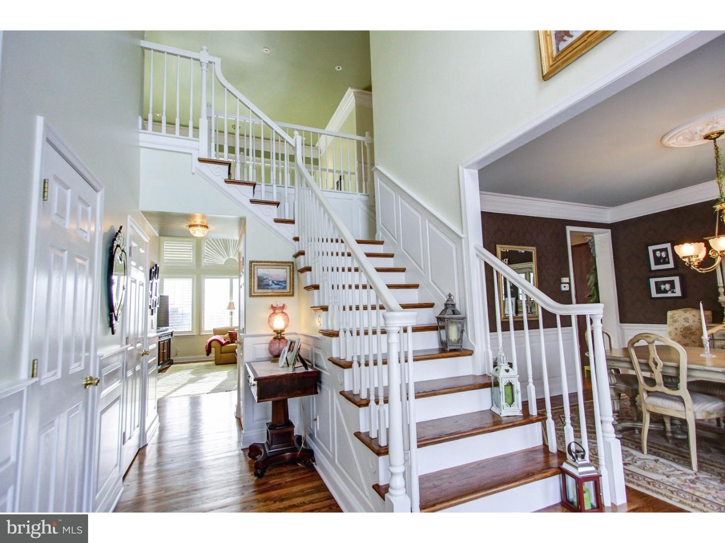 5237 Windtree Drive Doylestown, PA 18902 - Photo 2 of 25 a view of entryway and hall with wooden floor