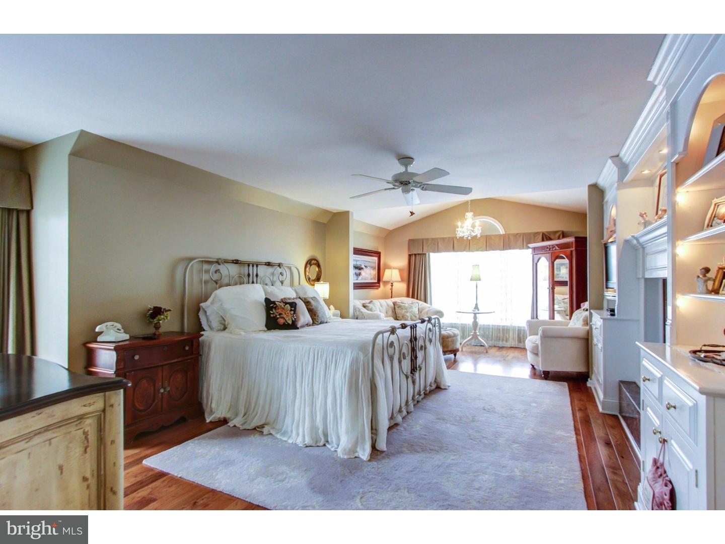 5237 Windtree Drive Doylestown, PA 18902 - Photo 13 of 25 a bedroom with furniture and a large window