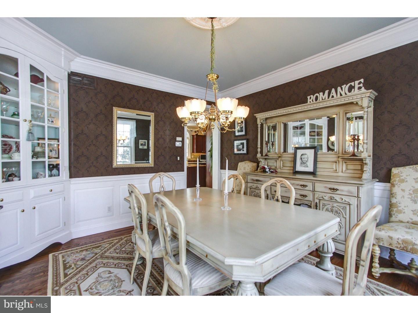 5237 Windtree Drive Doylestown, PA 18902 - Photo 3 of 25 a view of a dining room with furniture and chandelier