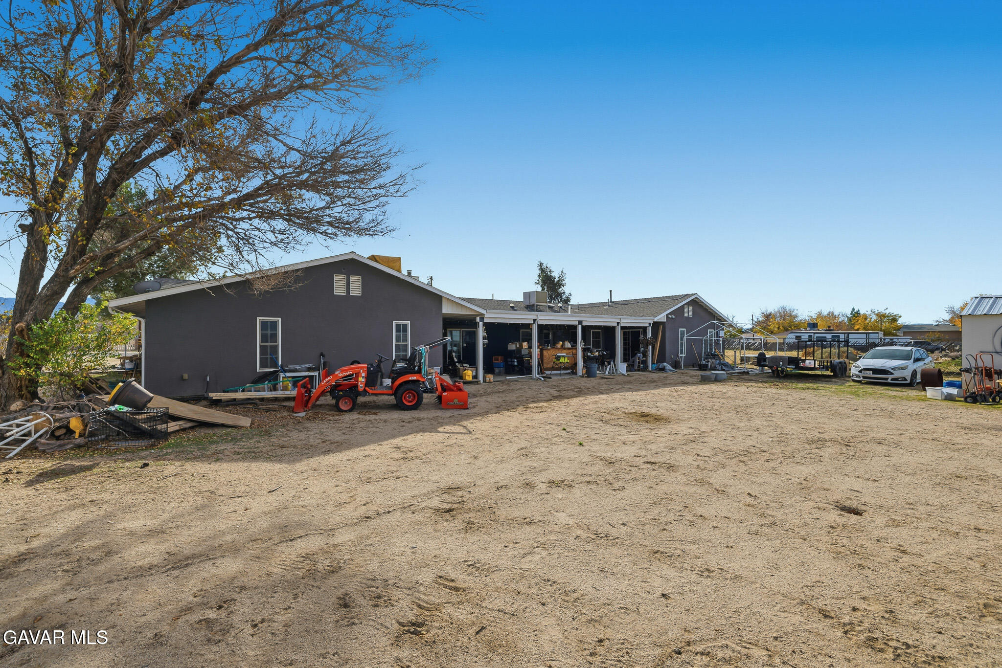 10817 East Ave R 12 Littlerock, CA 93543 - Photo 30 of 43 a view of a house with backyard