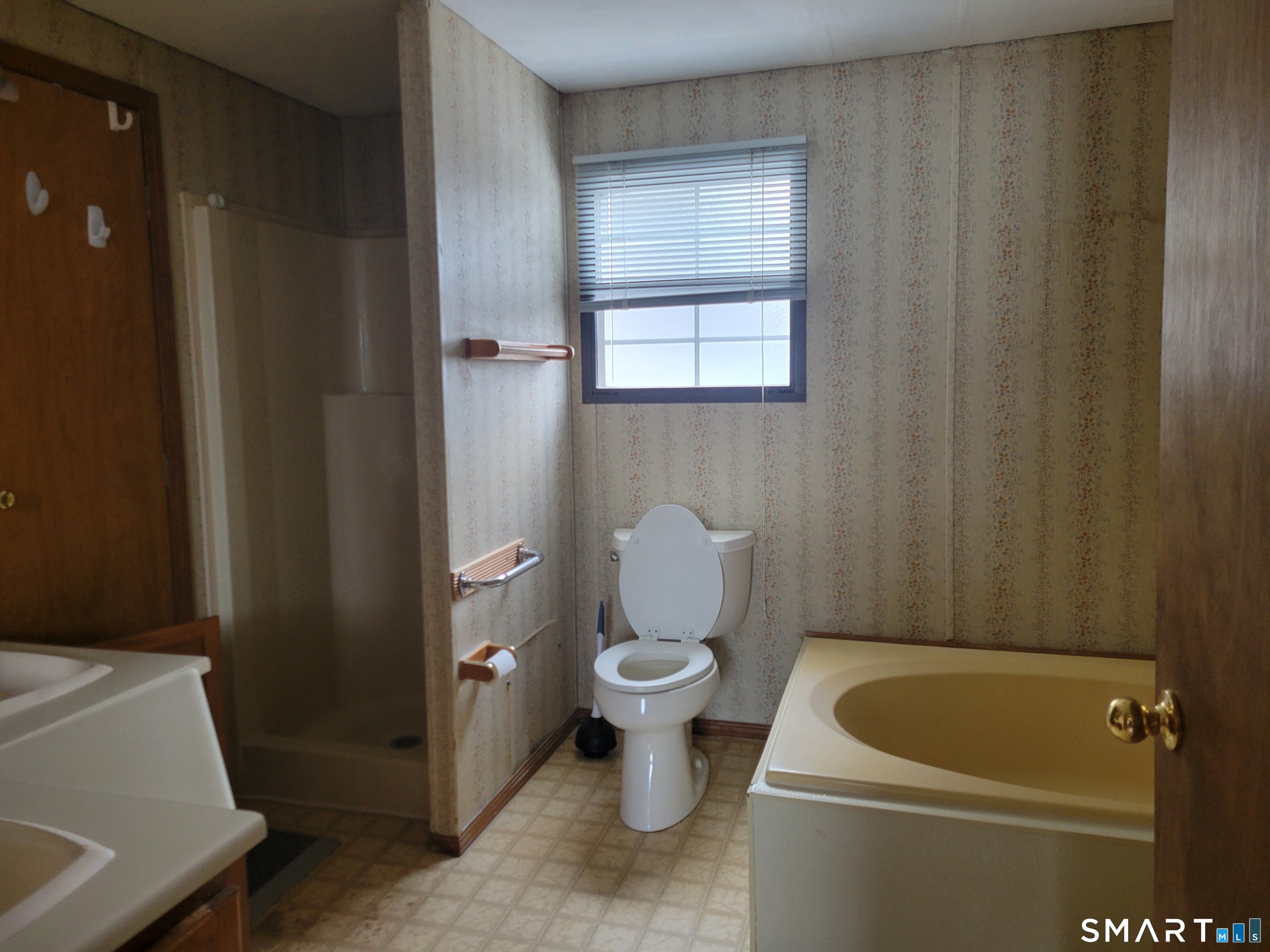 172 D Street Groton, CT 06340 - Photo 11 of 11 a bathroom with a toilet and a sink