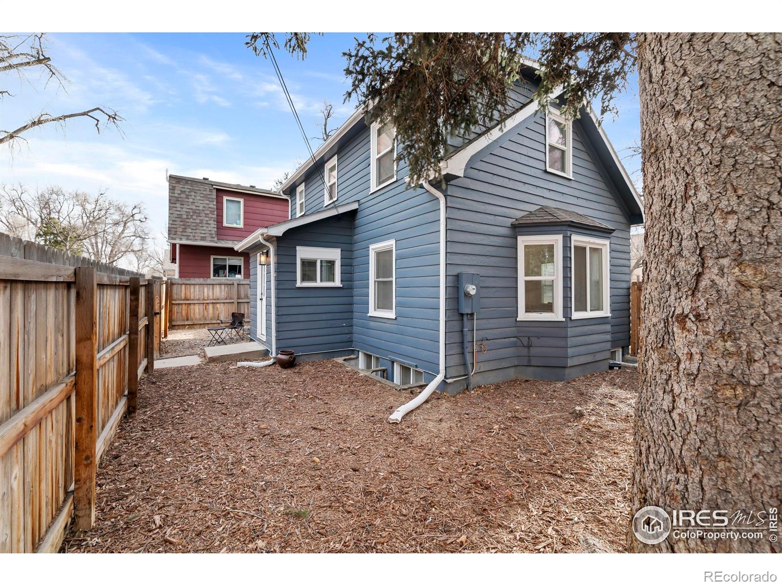814 West Laurel Street Fort Collins, CO 80521 - Photo 26 of 35 a view of a house with a backyard