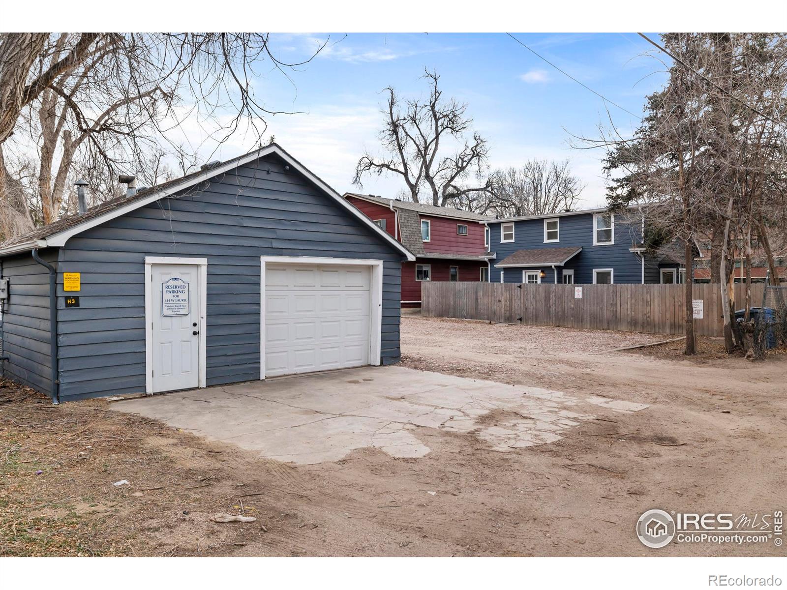 814 West Laurel Street Fort Collins, CO 80521 - Photo 29 of 35 a view of a house with a yard