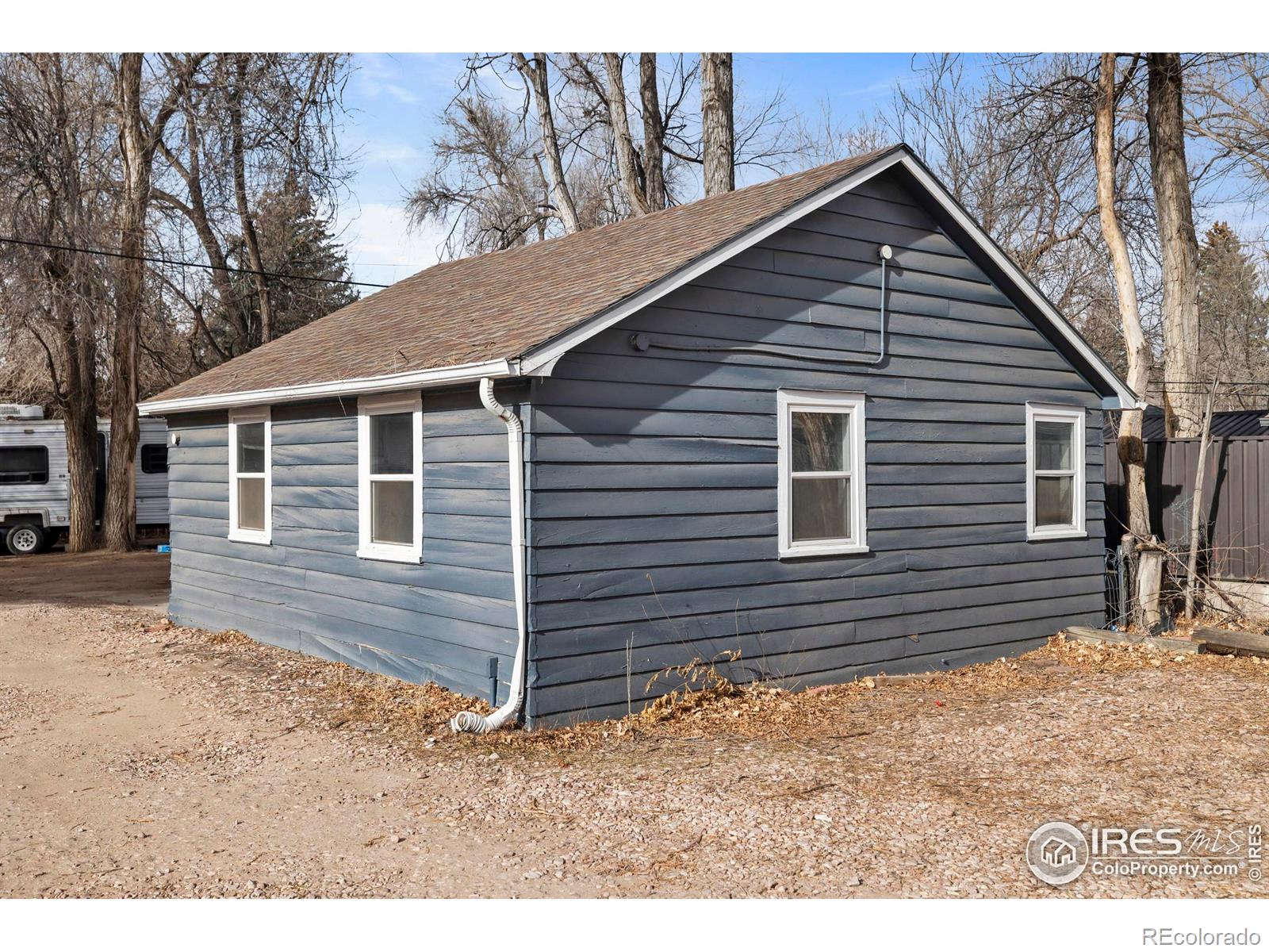 814 West Laurel Street Fort Collins, CO 80521 - Photo 30 of 35 a view of a house with a yard