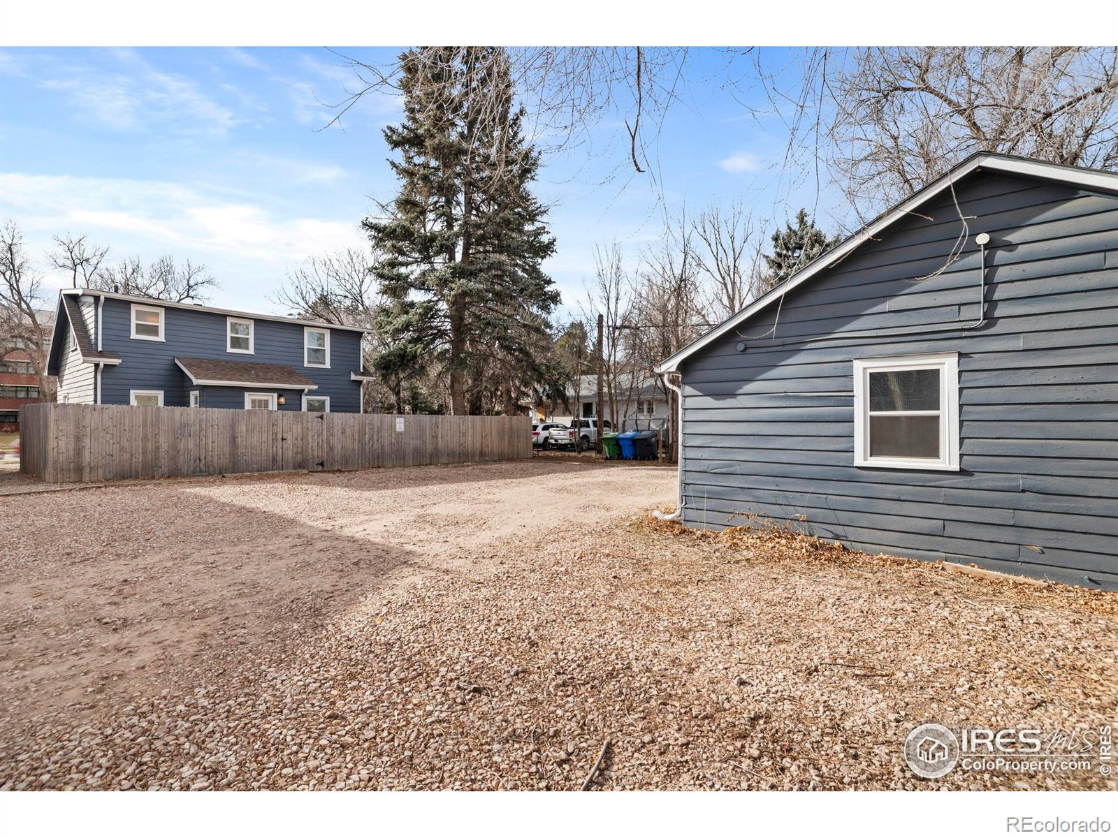 814 West Laurel Street Fort Collins, CO 80521 - Photo 31 of 35 a backyard of a house with lots of green space