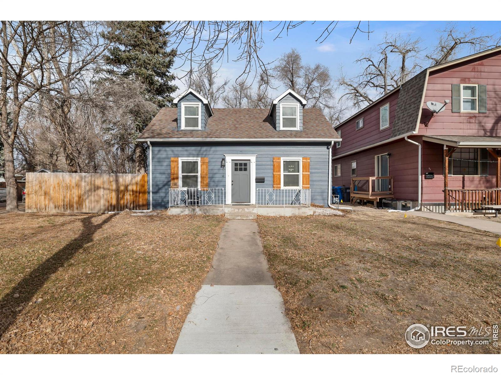 814 West Laurel Street Fort Collins, CO 80521 - Photo 35 of 35 a front view of a house with a yard