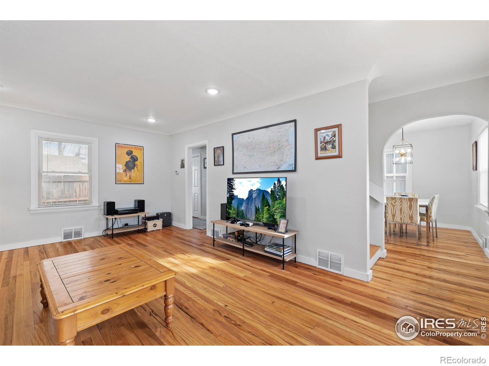 814 West Laurel Street Fort Collins, CO 80521 - Photo 7 of 35 a living room with furniture and wooden floor