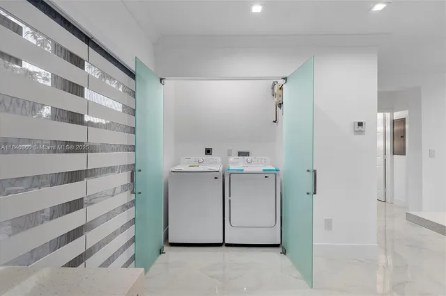 a view of cabinets and utility room