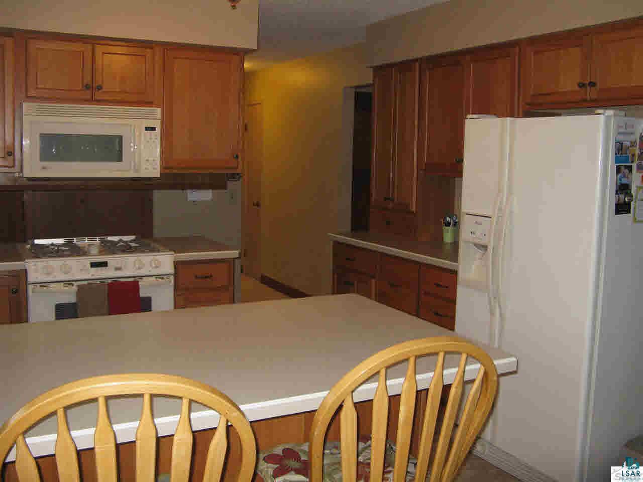 5540 Koenen Road South Range, WI 54874 - Photo 7 of 25 Even the Fridge area offers counter space and more storage.
