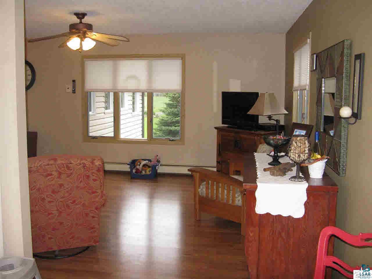 5540 Koenen Road South Range, WI 54874 - Photo 9 of 25 Spacious LR is the heart of all your gatherings. Easy care floor too!