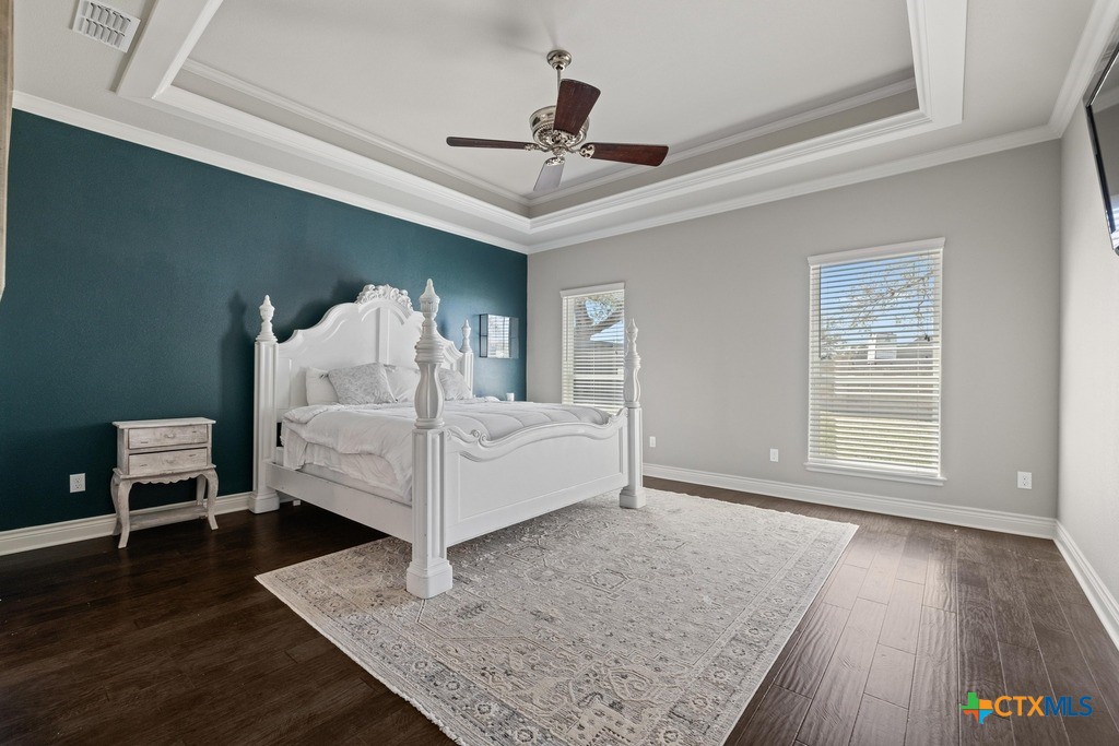 1745 Alta Vista Loop Temple, TX 76502 - Photo 18 of 34 a white bed sitting in a bedroom next to a window