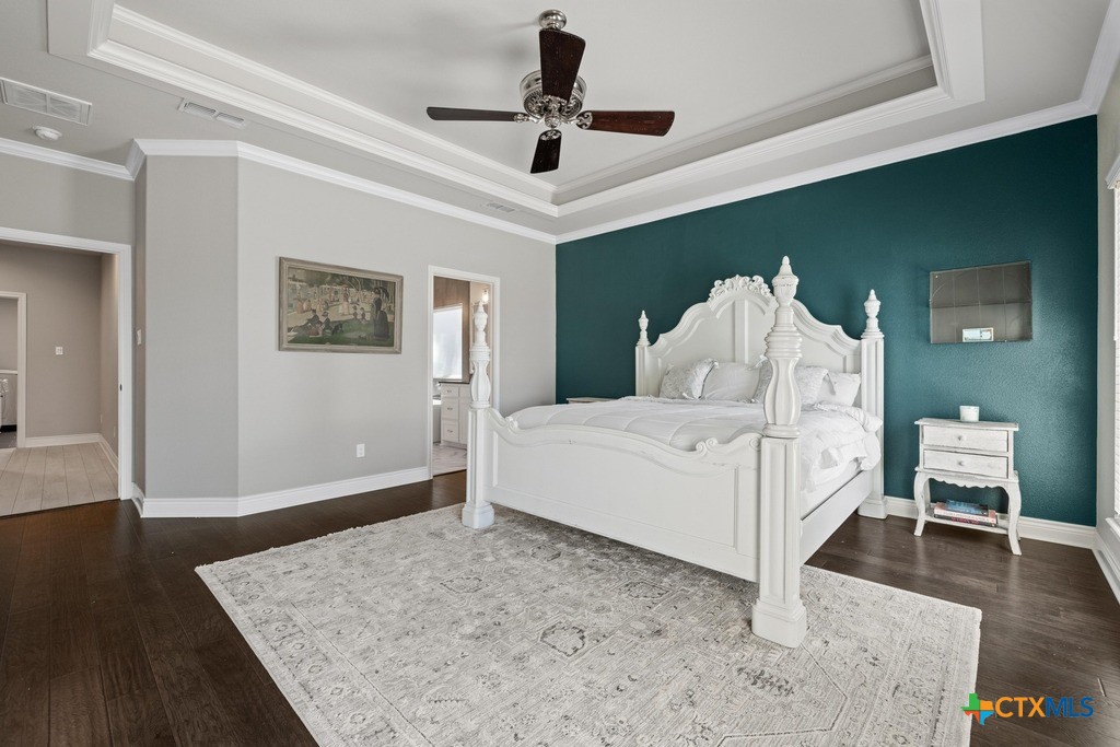 1745 Alta Vista Loop Temple, TX 76502 - Photo 19 of 34 a spacious bedroom with a bed and a walk in closet