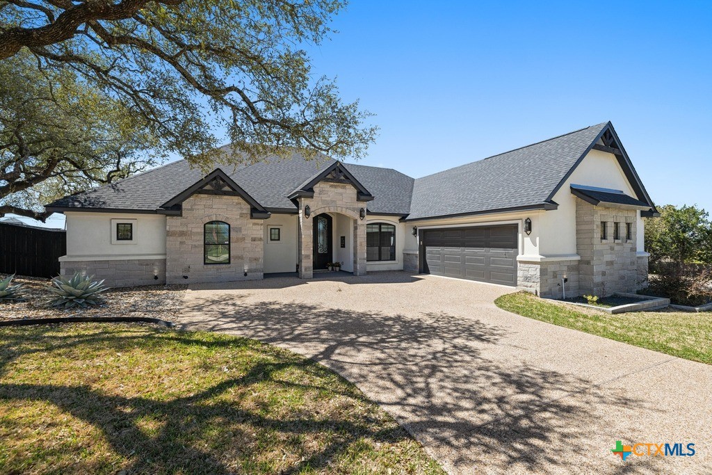 1745 Alta Vista Loop Temple, TX 76502 - Photo 2 of 34 a front view of a house with a yard
