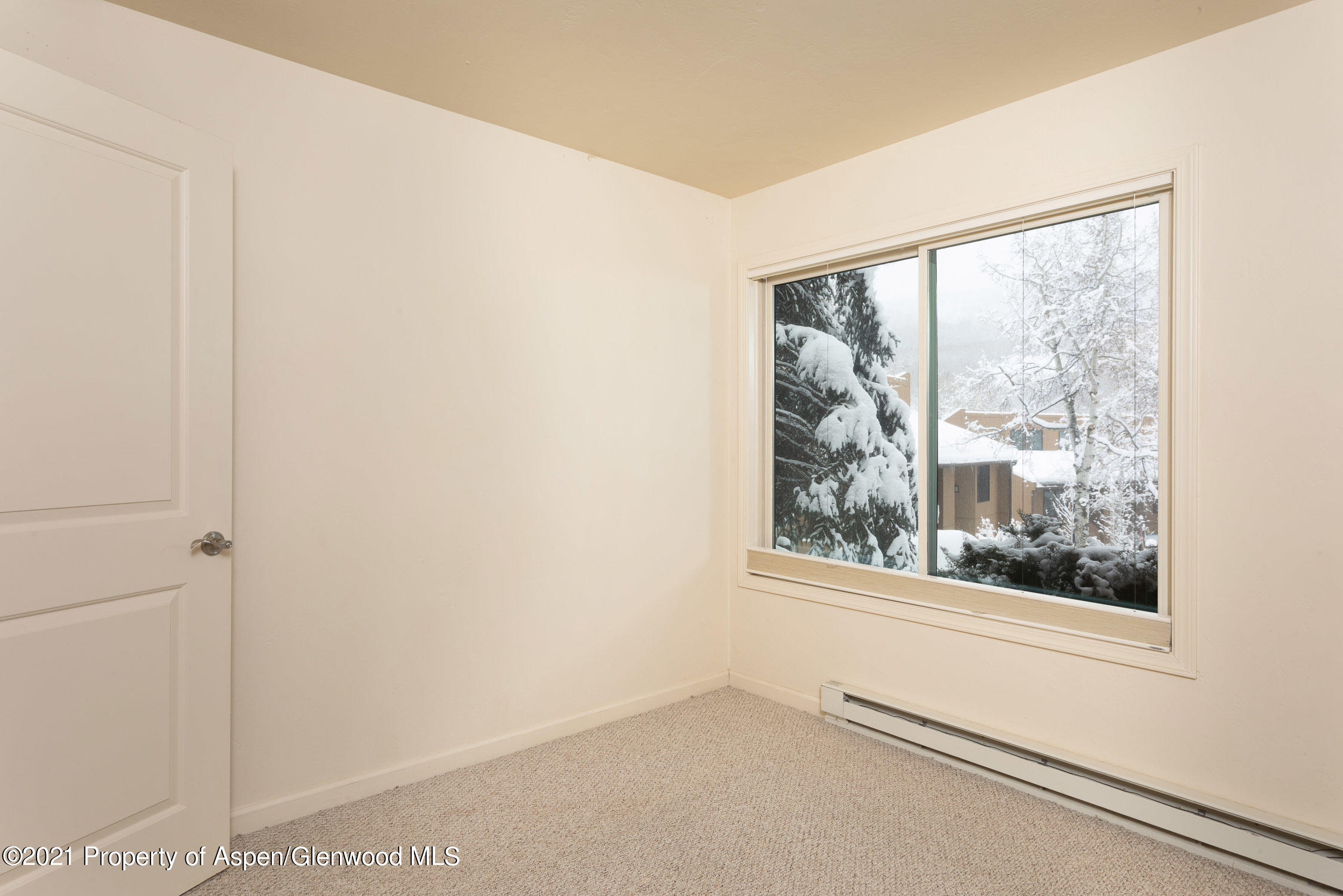 35 Lower Woodbridge Road, Unit 155 Snowmass Village, CO 81615 - Photo 11 of 14 a view of a room that has a window in it