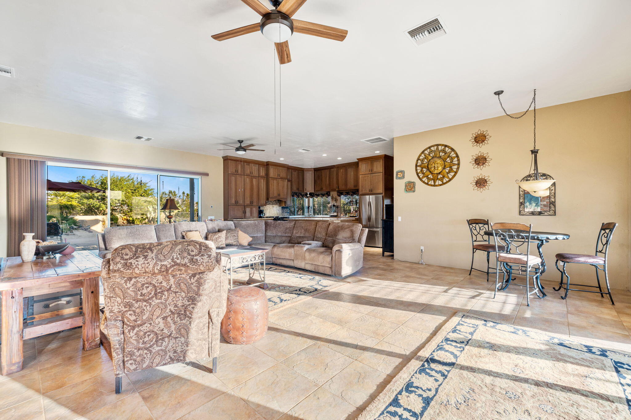 22950 Henry Road Desert Hot Springs, CA 92241 - Photo 15 of 68 a living room with furniture and a large window