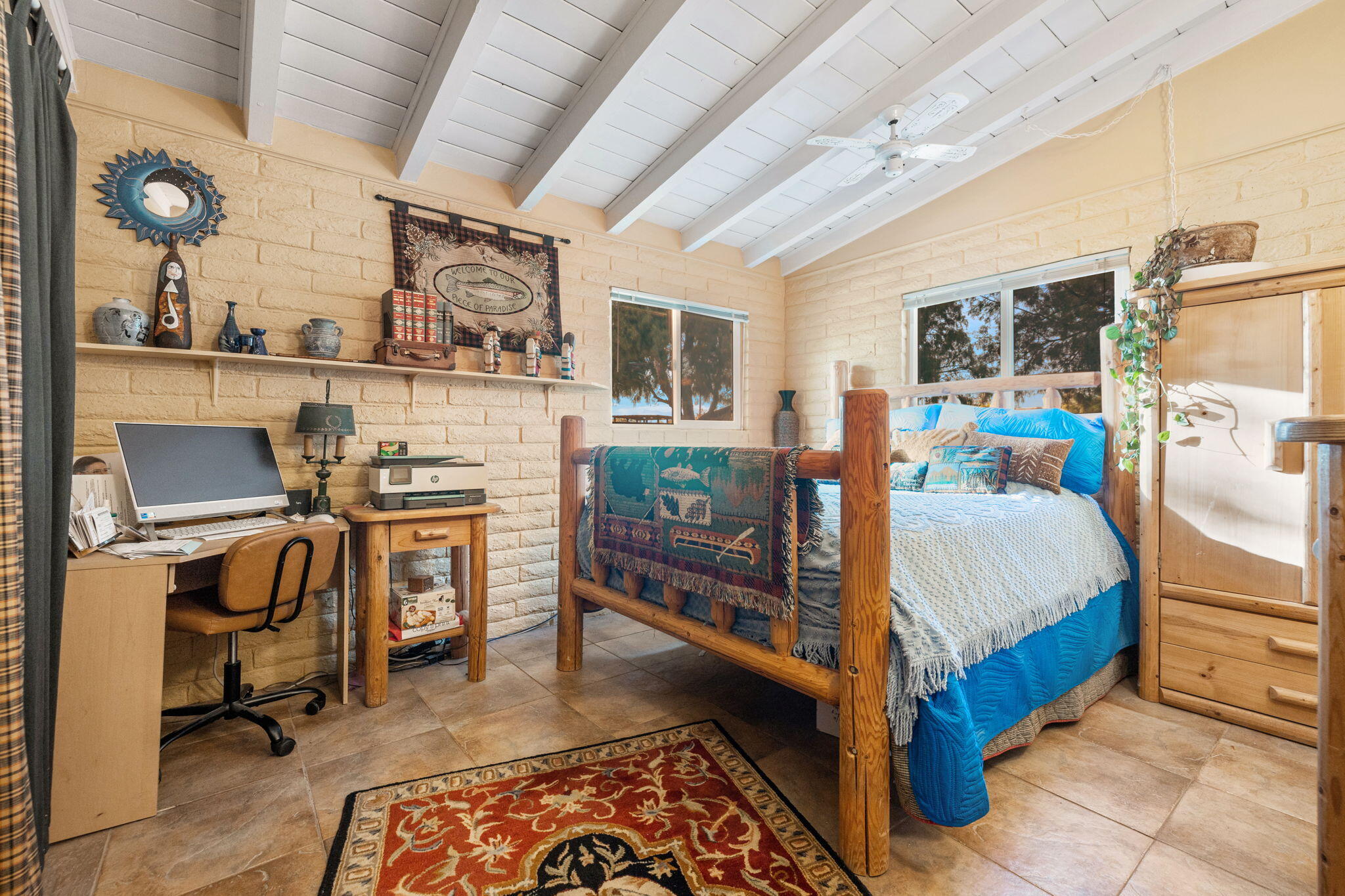 22950 Henry Road Desert Hot Springs, CA 92241 - Photo 21 of 68 a bed room with furniture and a window