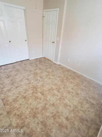 a bathroom with a granite countertop shower