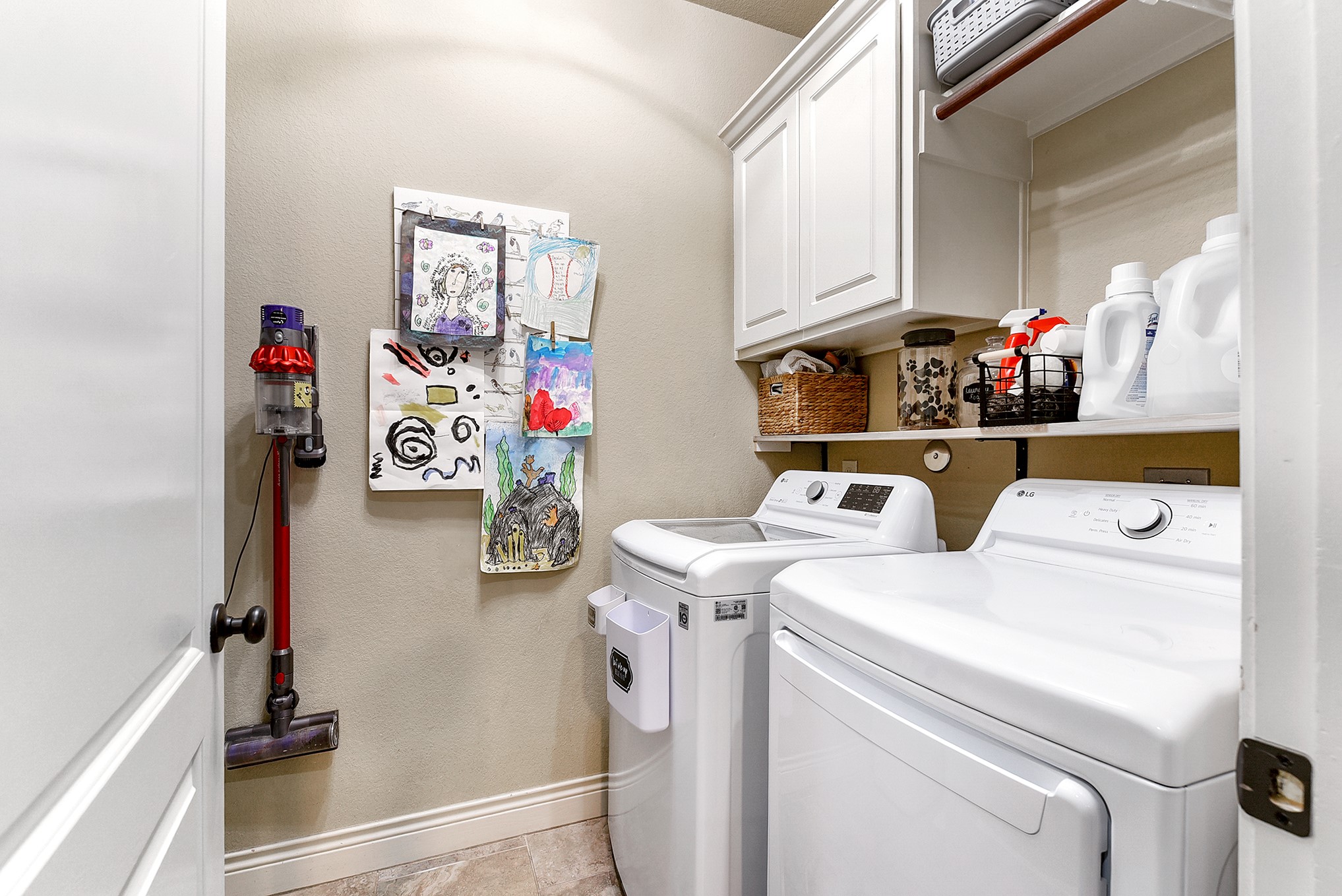 2939 Bobby Jones Road Katy, TX 77494 - Photo 43 of 50 a utility room with dryer and washer