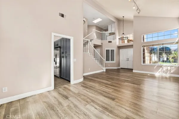 a street sign on a wall next to a building