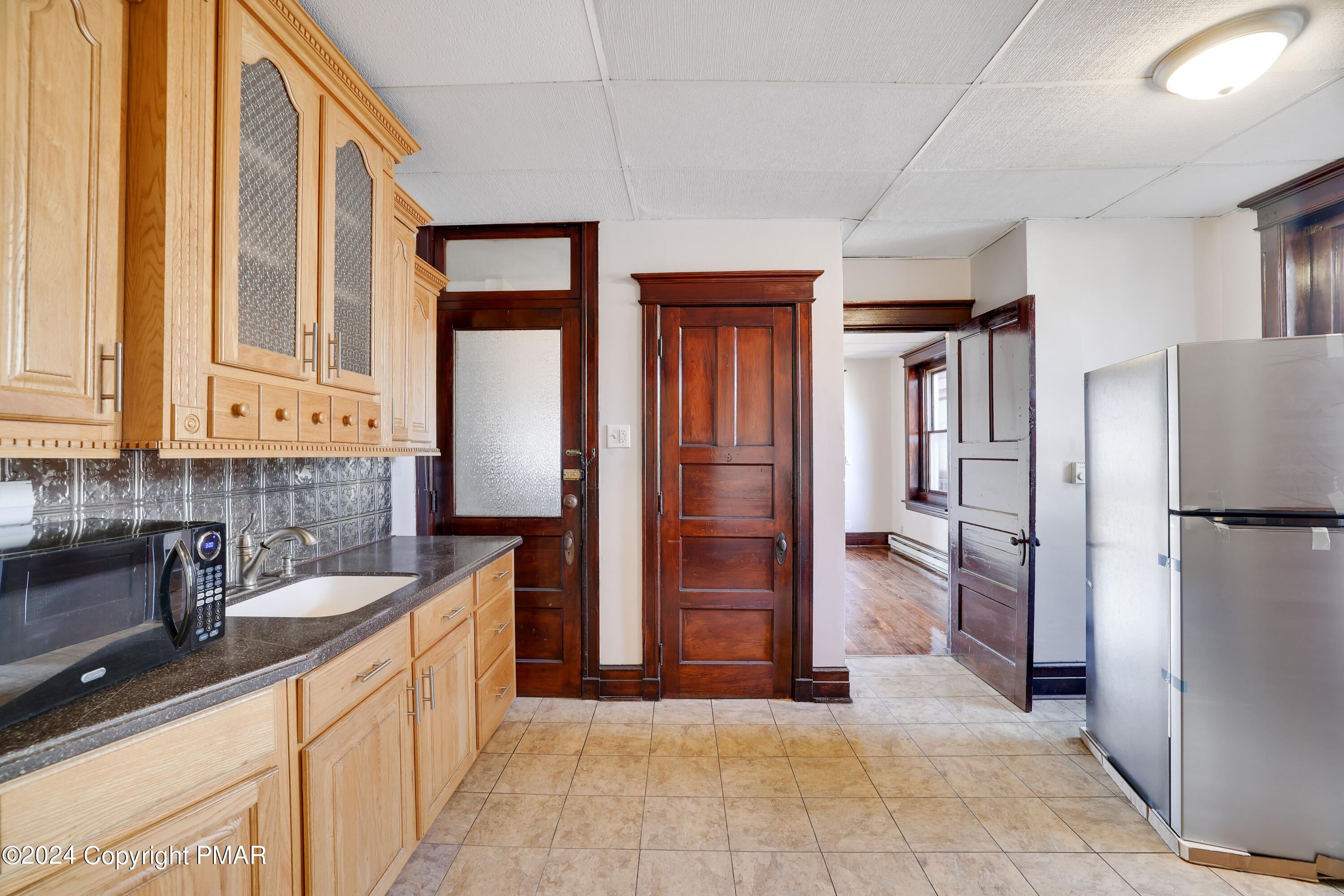 139 South Main Street Nazareth, PA 18064 - Photo 13 of 24 a kitchen with stainless steel appliances granite countertop a refrigerator and a sink