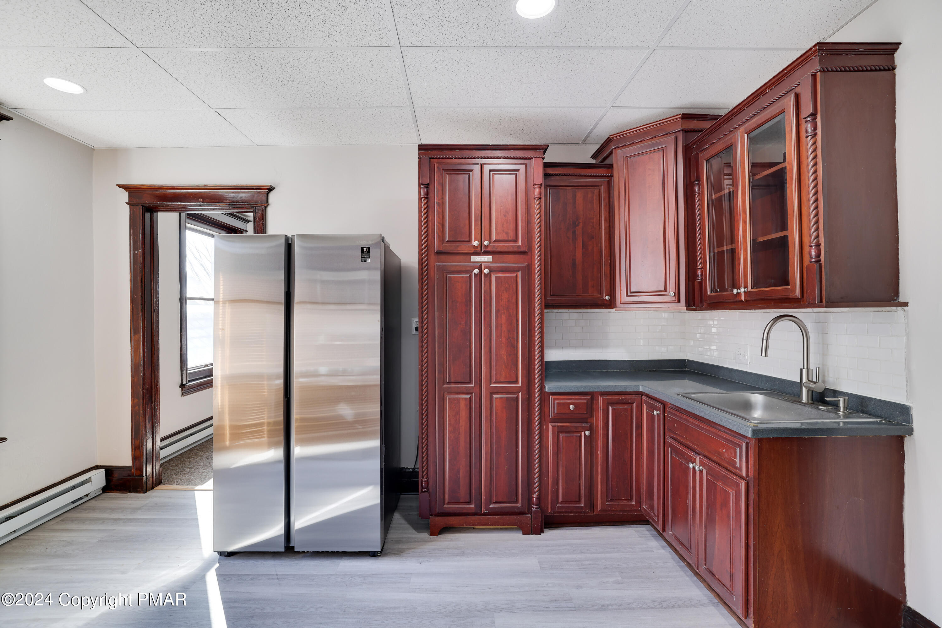 139 South Main Street Nazareth, PA 18064 - Photo 19 of 24 a kitchen with stainless steel appliances granite countertop a refrigerator and a sink